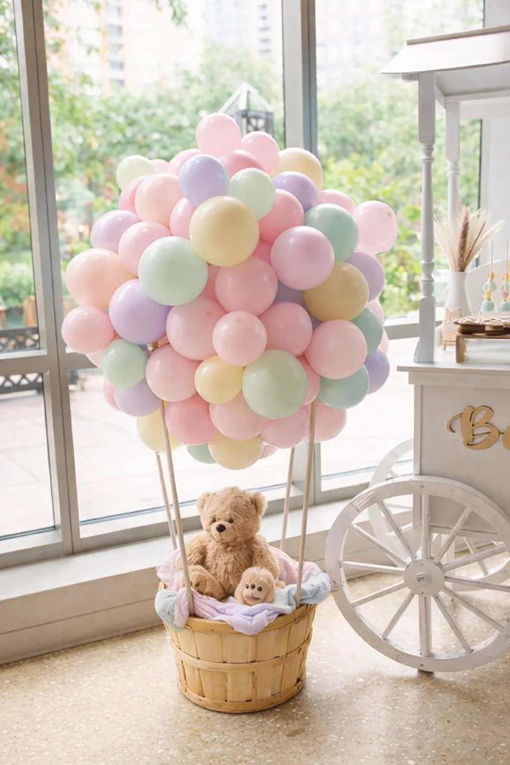 Organic balloon garland by Little Moment Studio — flowing air-filled display in pastel colours for a baby shower in Kent